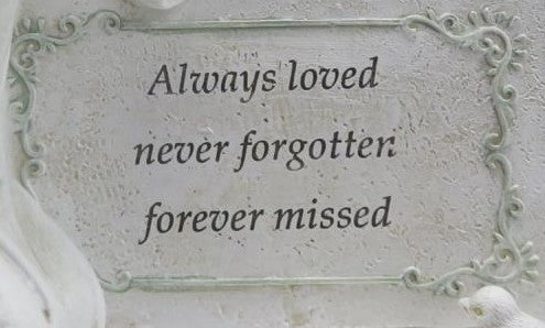 Cherub Kneeling on Memorial Plaque