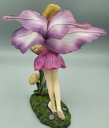 Purple Fairy Resting on Mushroom and Butterfly Wings